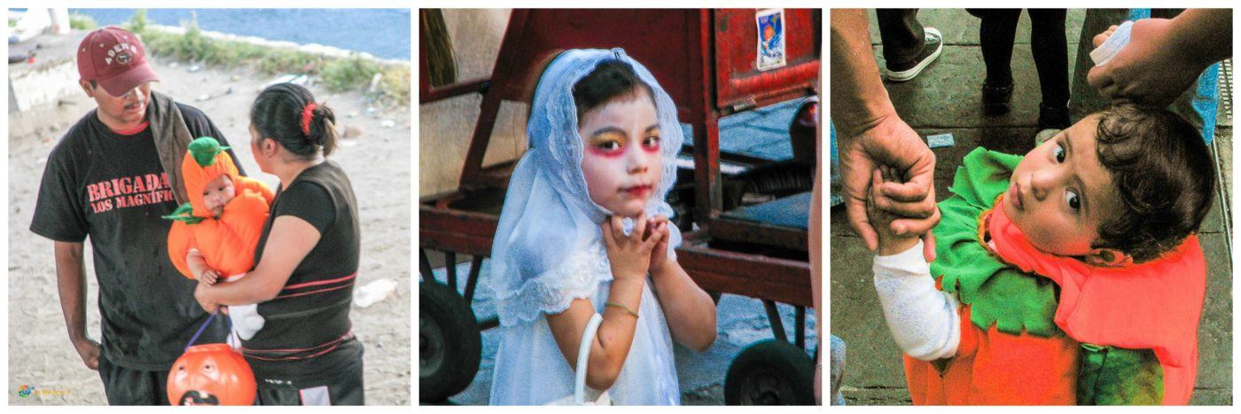 Mexicans dress their kids in costume for Day of the Dead - here, 2 pumpkins and a ghoul.