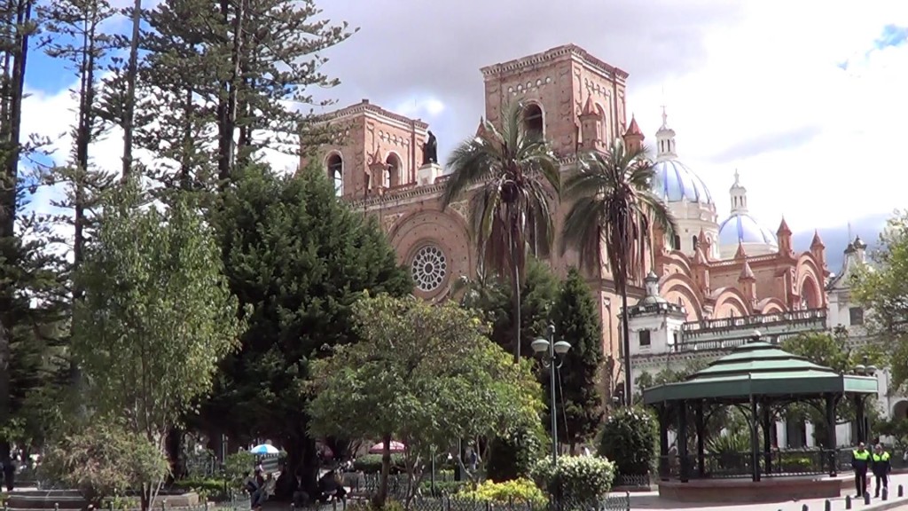 blue church domes in Parque Calderon Cuenca Ecuador