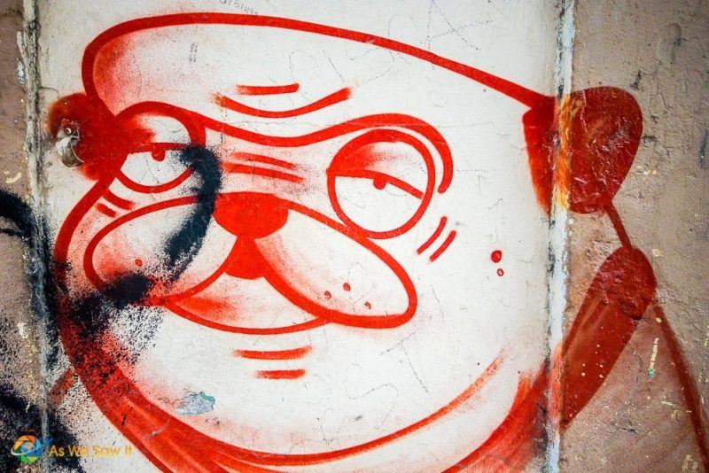 Casco Viejo Street Art dog, red line drawing on white background