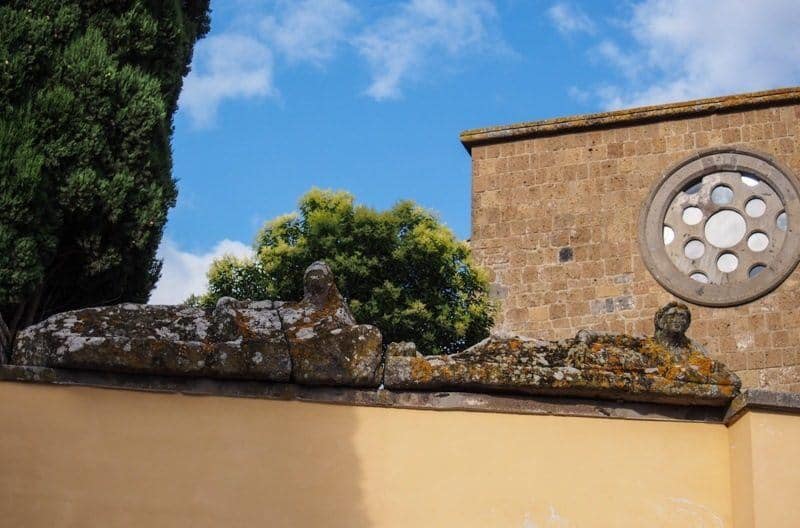 Remnants of Etruscan Tuscania on a wall, eroded by centuries of weather.