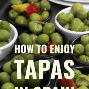 small bowls of green olives with text overlay "how to enjoy tapas in Spain"