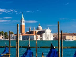 Gondolas and skyline of St Mark's Square Venice Italy