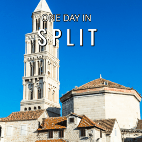 white marble tower and buildings, red tile roofs, blue sky in Split Croatia