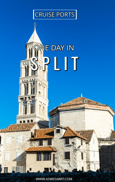 white marble tower and buildings, red tile roofs, blue sky in Split Croatia