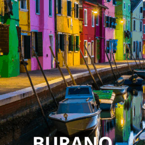 Colorful houses line a canal in Burano Italy. Text overlay says Burano What to See and Do