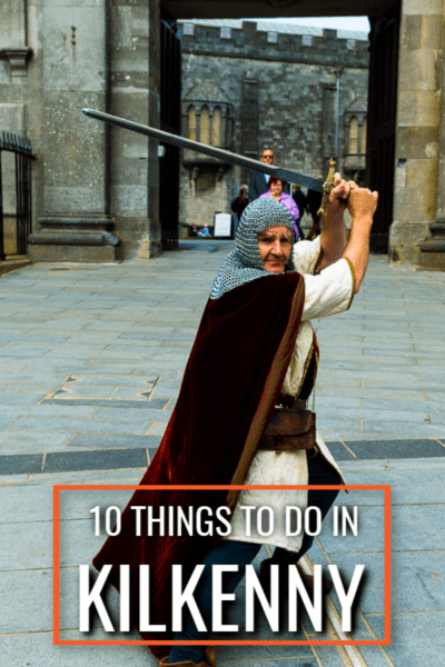 Sir Mike wields a sword in front of Kilkenny castle. Text overlay 10 Things to Do in Kilkenny