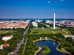 View of reflecting pool and Washington Monument on National Mall from the top of the LIncoln Memorial steps in Washington DC