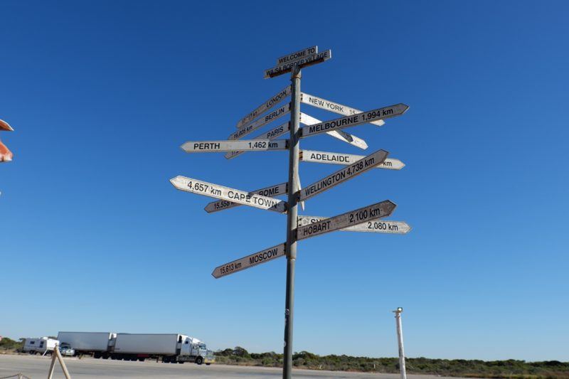 Directional signpost pointing to many different places in Australia and around the world.