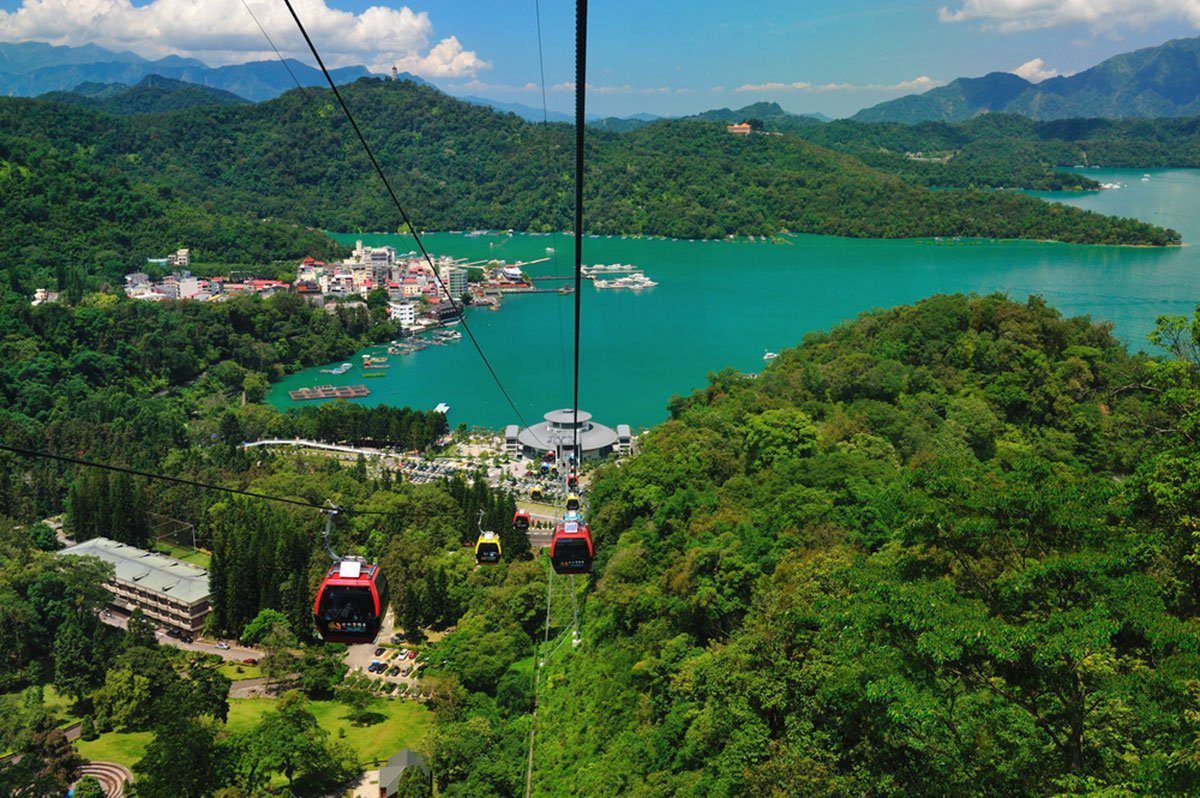 Cable cars rise from Sun Moon Lake Taiwan. Best attractions