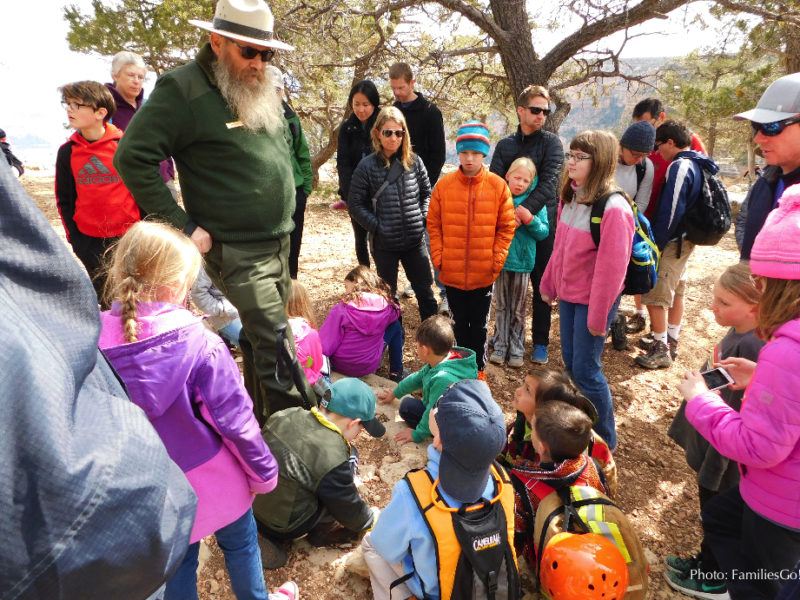 NPS Ranger talking to families, explaining all the Grand Canyon things to know.