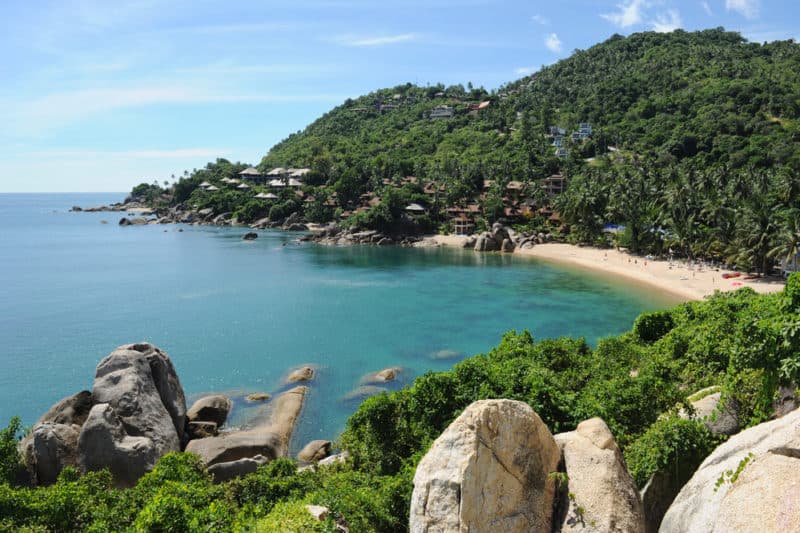 Lamai Beach bordered by iridescent, teal green waters and green hills