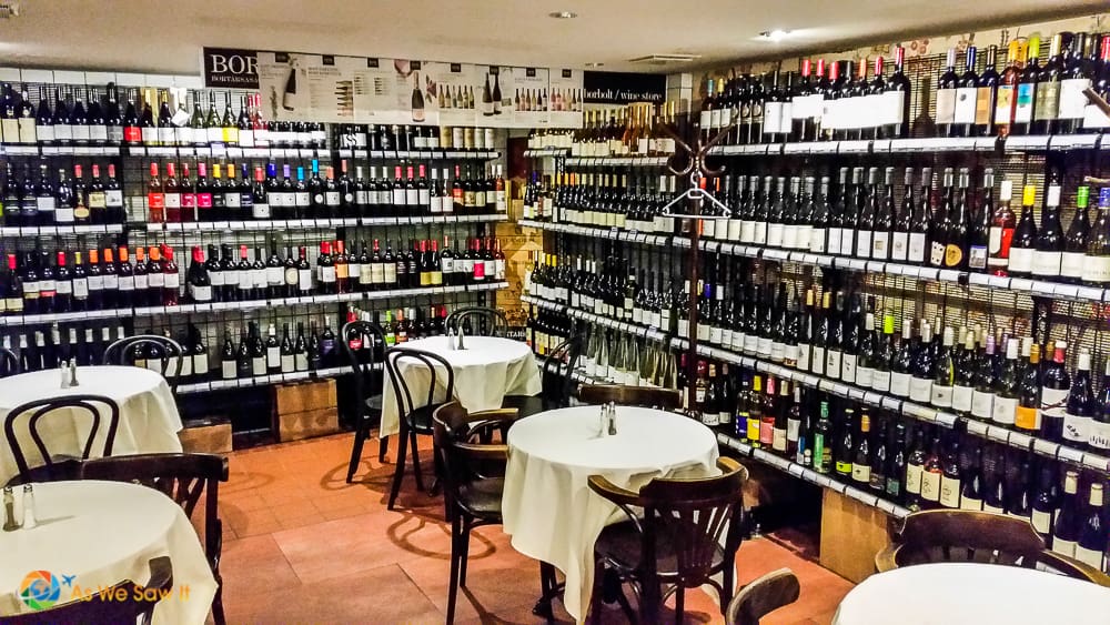 Tables and bottles of Hunarian wine in Budapest cafe