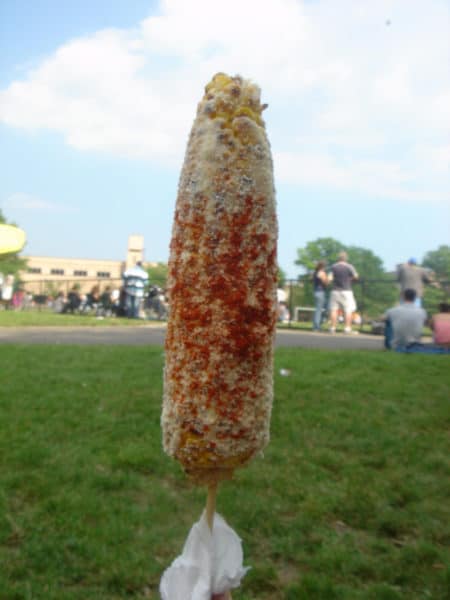 A grilled ear of corn, coated in mayo, cheese, and chili powder, and jabbed onto a stick. You may never eat corn the old way again.