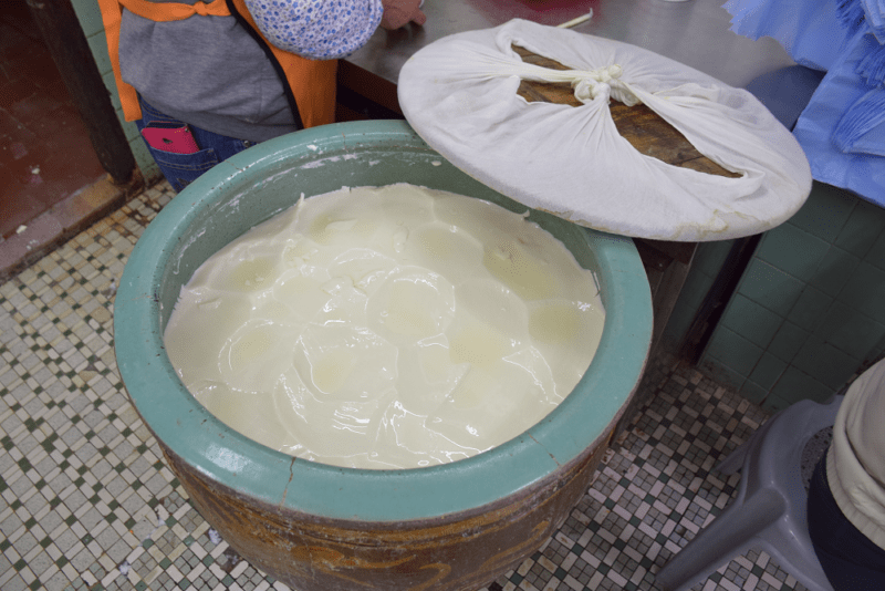 Large pot of tofu on the floor of a Hong Kong restaurant