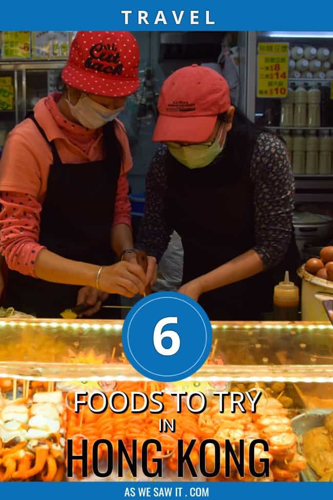 Two people preparing Hong Kong food behind a counter. Probably fish balls.