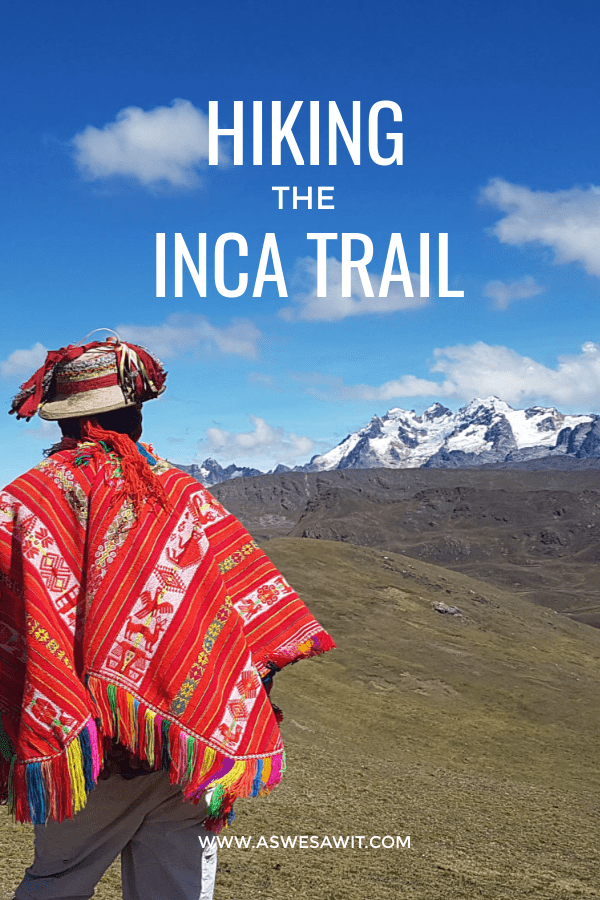 Peruvian man looks at mountains in distance