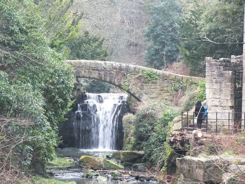 Stone bridge and waterfall at Jesmond Dene Mill