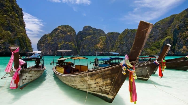 boats on a beach in Thailand