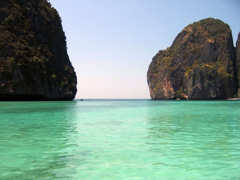 green water and two rocks that mark the entrance to Maya Bay