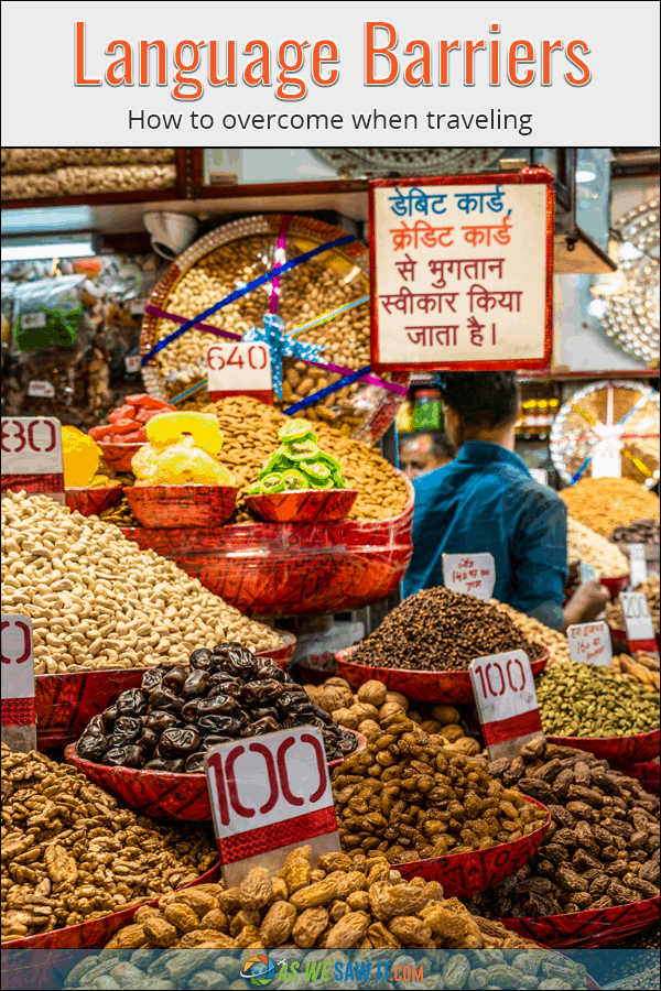 Hindi sign in a spice market in India. Banner above the photo says Language Barriers: How to Overcome when Traveling.