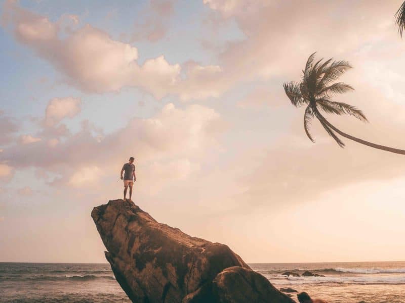 Man standing on Wijaya rock