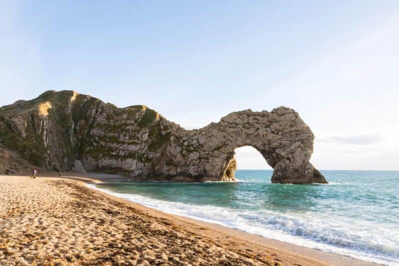 beach with arched rock outcropping.