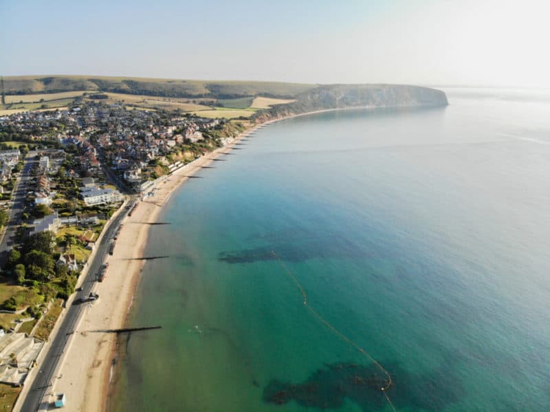 Arial view of a beach-side town.