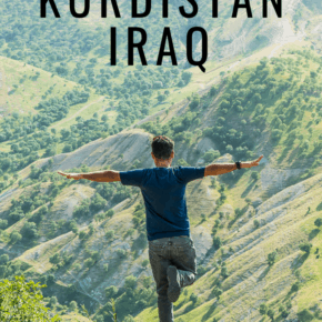 Man balancing on narrow outcrop. Text overlay says Undiscovered Kurdistan Iraq