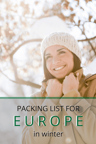 woman bundled with hands closing her collar text says packing list for europe in winter