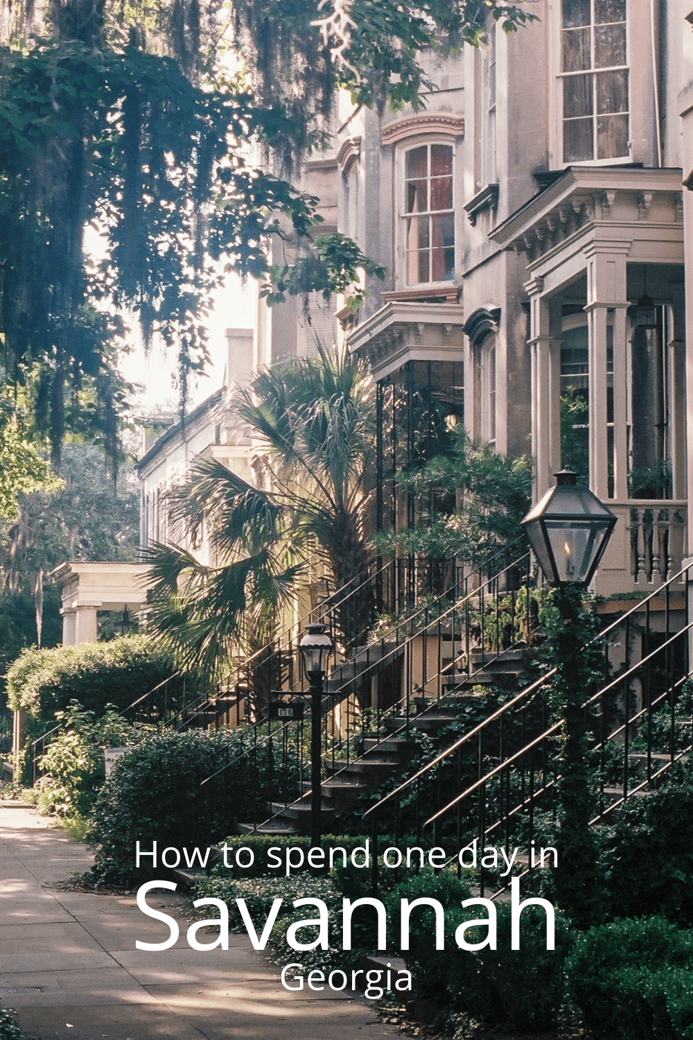 Colonial homes along a sidewalk in Savannah, Georgia. Text overlay says "How to spend one day in Savannah Georgia"