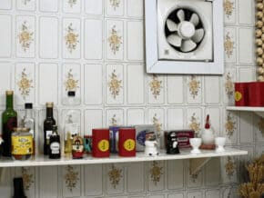 1970s kitchen shelf and fan ripe for a home update.