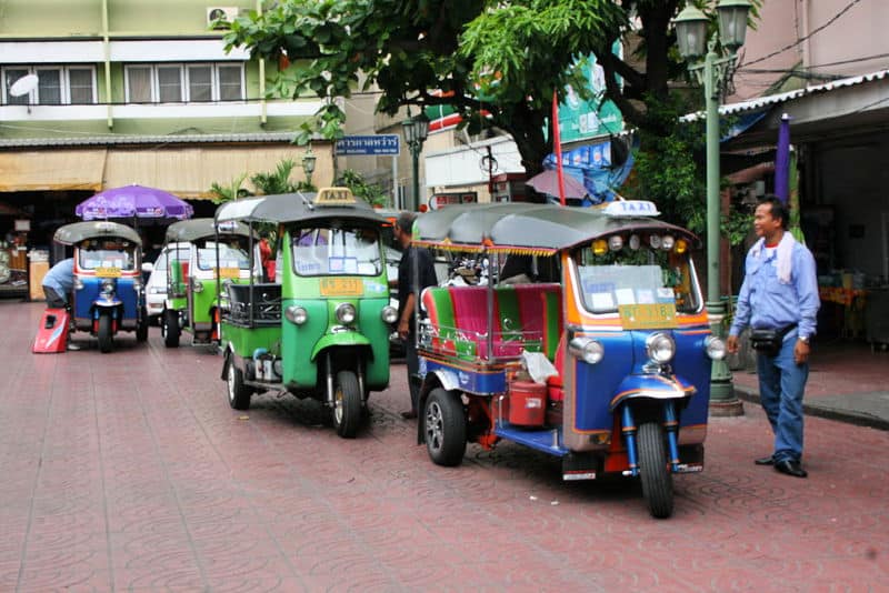 Row of tuk-tuk vehicles in Bangkok Thailand