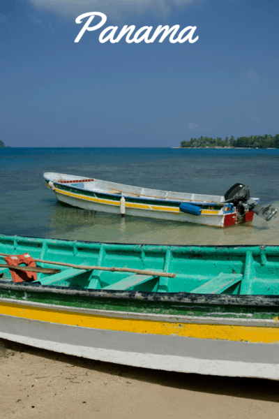 boats on the beach in panama text says panama