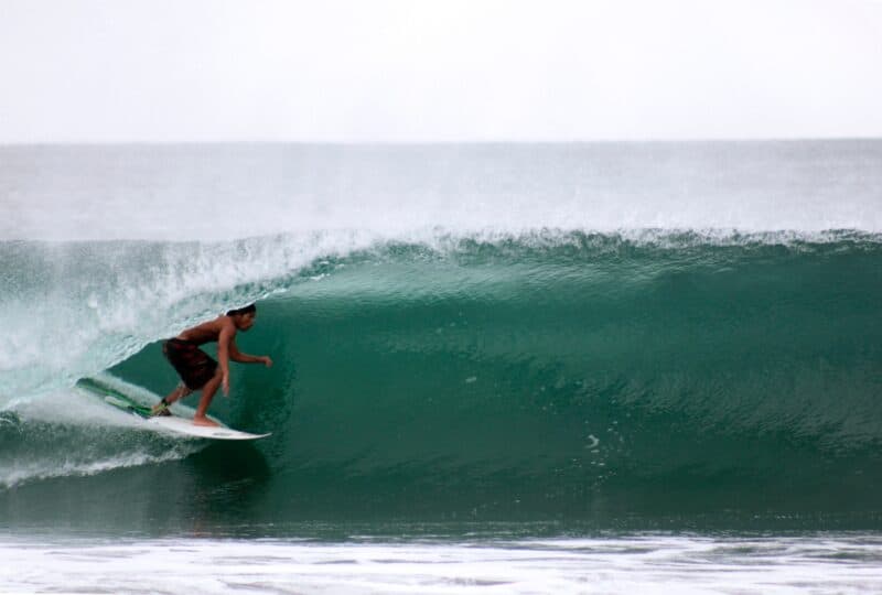 surfing a pipeline wave at a mexican riviera cruise port