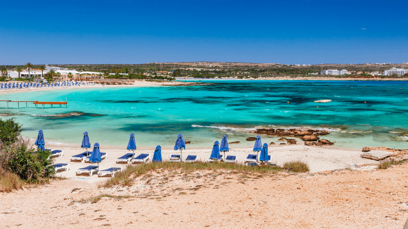 Umbrellas and beach chairs on Ayia Napa beach in Cyprus