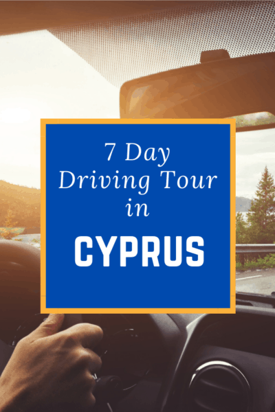 inside a car driving text says 7 day driving tour in cyprus