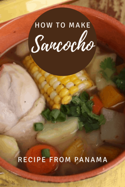 Bowl of chicken stew known as sancocho de gallina. Text overlay says "How to Make Sancocho. Recipe from Panama."