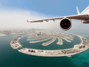 airplane wing above dubai - 1 week 7 day uae itinerary