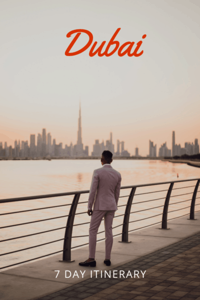 Man on walkway in Dubai. Text overlay says Dubai 7 day itinerary