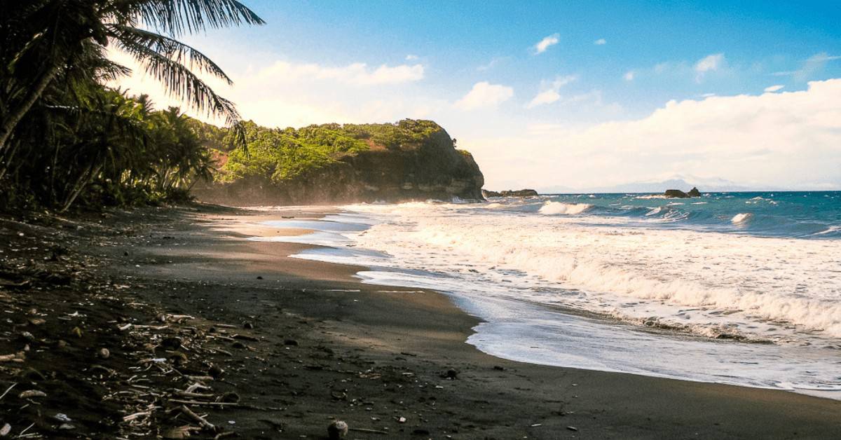 black sand beach on Domnica