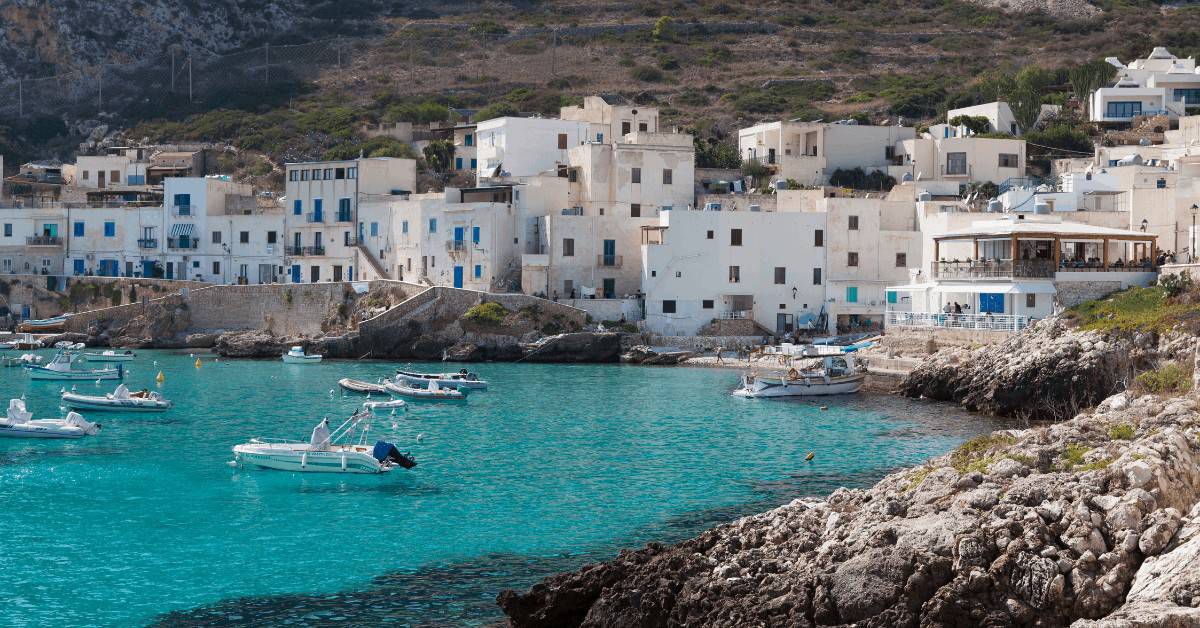 small boats anchored on the water in Ustica. 