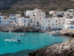 small boats anchored on the water in Ustica. 