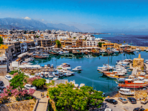 Harbor and town in Cyprus with ocean in background