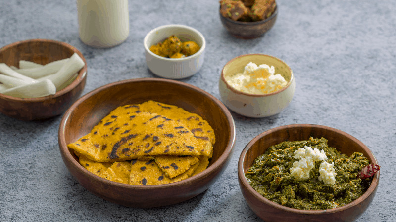 Makki ki roti breads, with sarson ka saag on the side.. Famous indian foods.