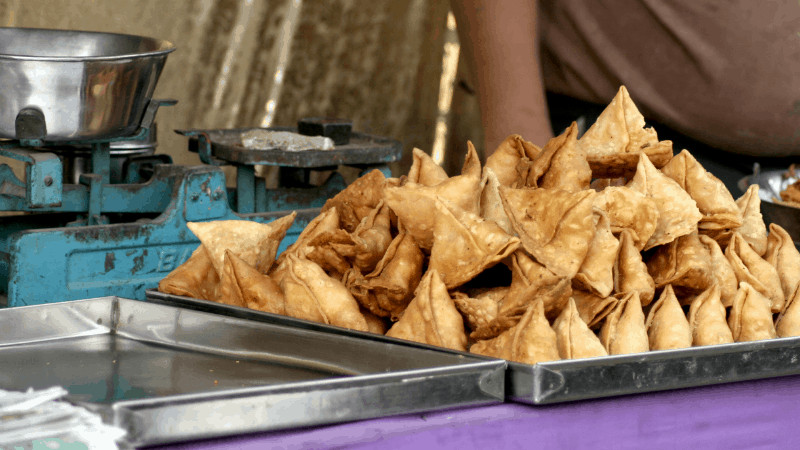 Samosas on a tray, famous Indian snacks