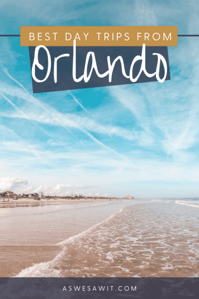 Waves lap the sand on a Florida beach. Text overlay says "best day trips from Orlando"