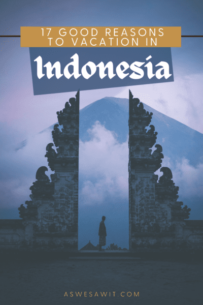 Person posing at Balinese temple gate with volcano in background. Text overlay says "17 good reasons to vacation in indonesia"
