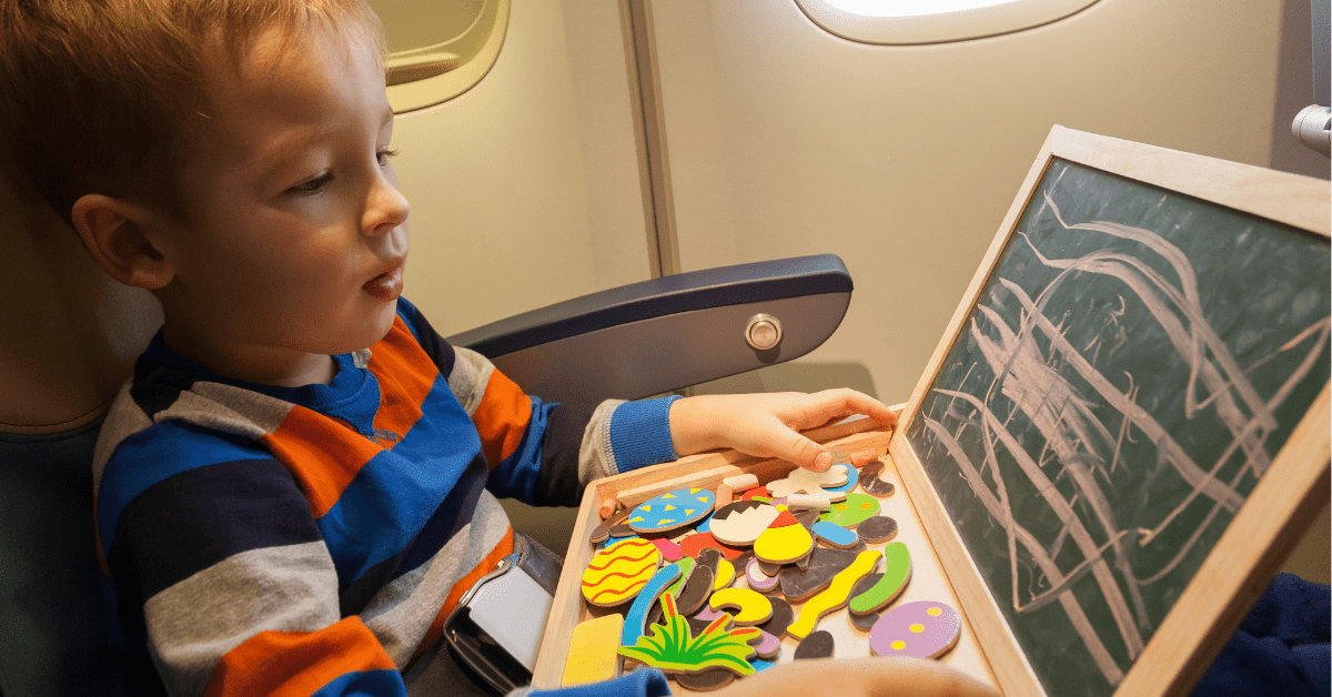 child having fun on an airplane