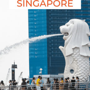 People standing around the Merlion in Merlion Park. Text overlay says "cool things to know before you travel to singapore"  