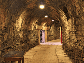 Passageway in the Paris Catacombs - one of the most unusual things to do in Paris